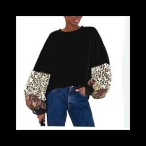 Black Sweater with Leopard Print Sleeves.31